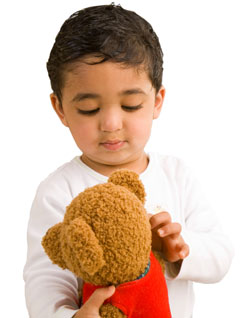 Child with teddy bear